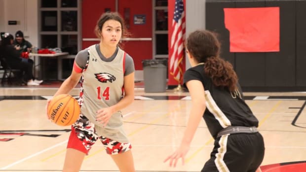 xp Ari Long maneuvers vs opposing player Valley View Moreno Valley girls basketball photo by John Murphy Jan 16 2023